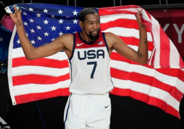 Golden again: US beats France 87-82 for Tokyo title